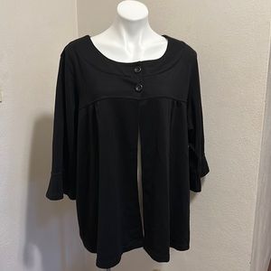 Gently worn 30/32 black 3/4 length sleeved jacket with slight ruffled cuffs.
